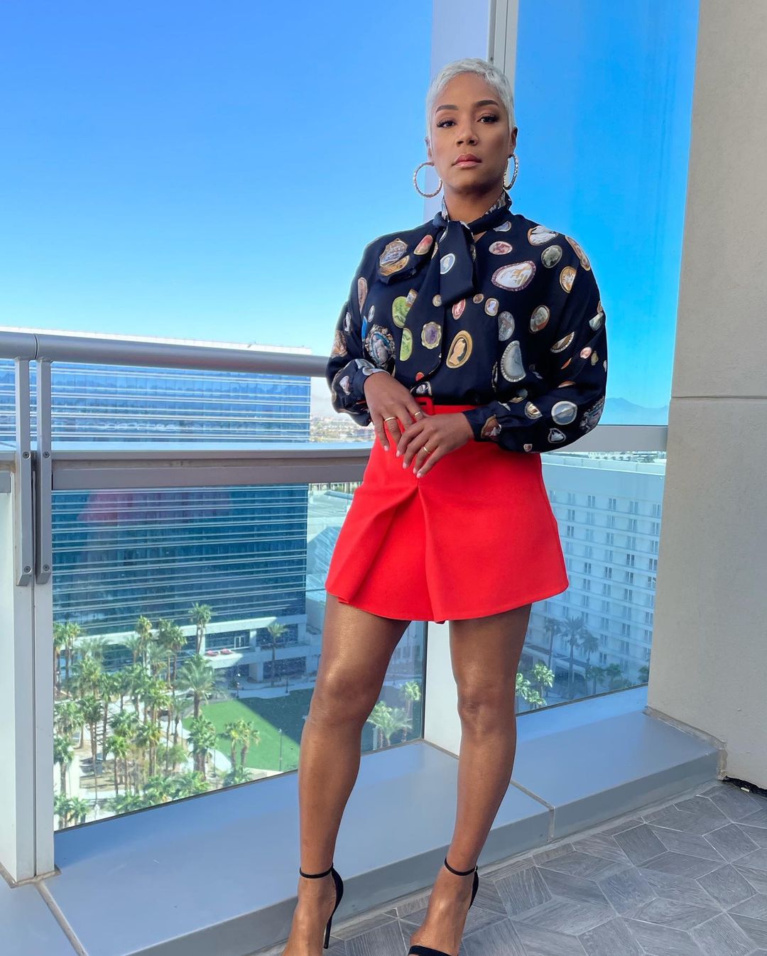 Tiffany Haddish posing on a hotel balcony, via Instagram